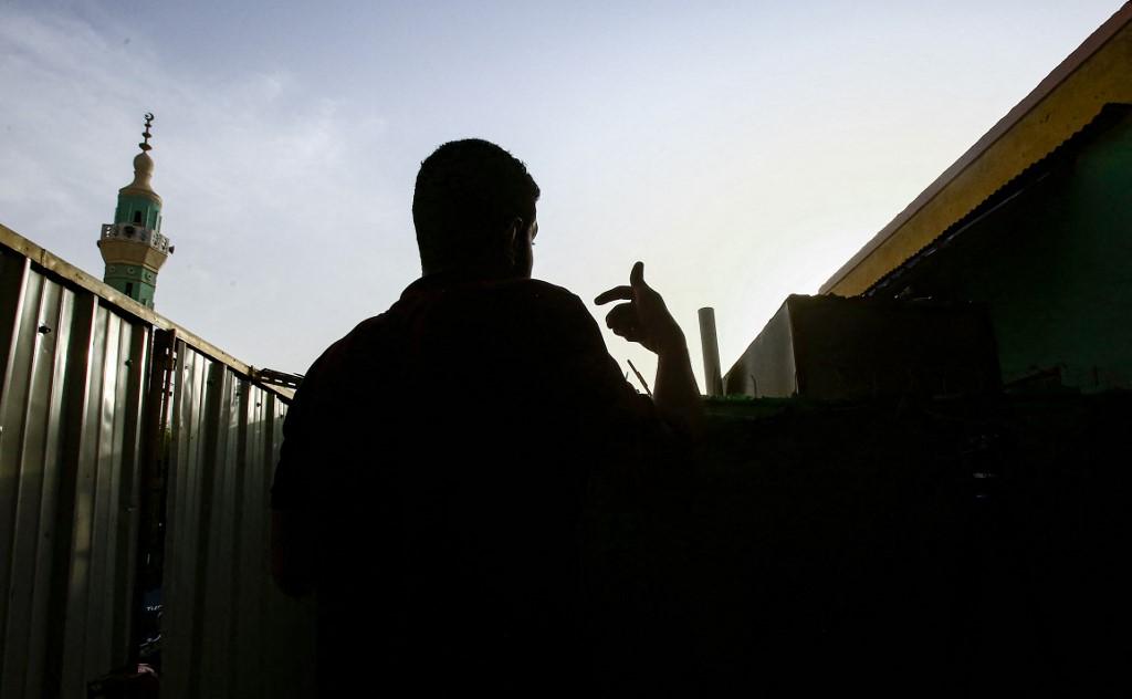 Activists claim the Egyptian state has targeted dissidents who moved abroad and in some cases their relatives still in Egypt. Above, an Egyptian student who fled to Khartoum, Sudan to escape political repression. (AFP file photo)
