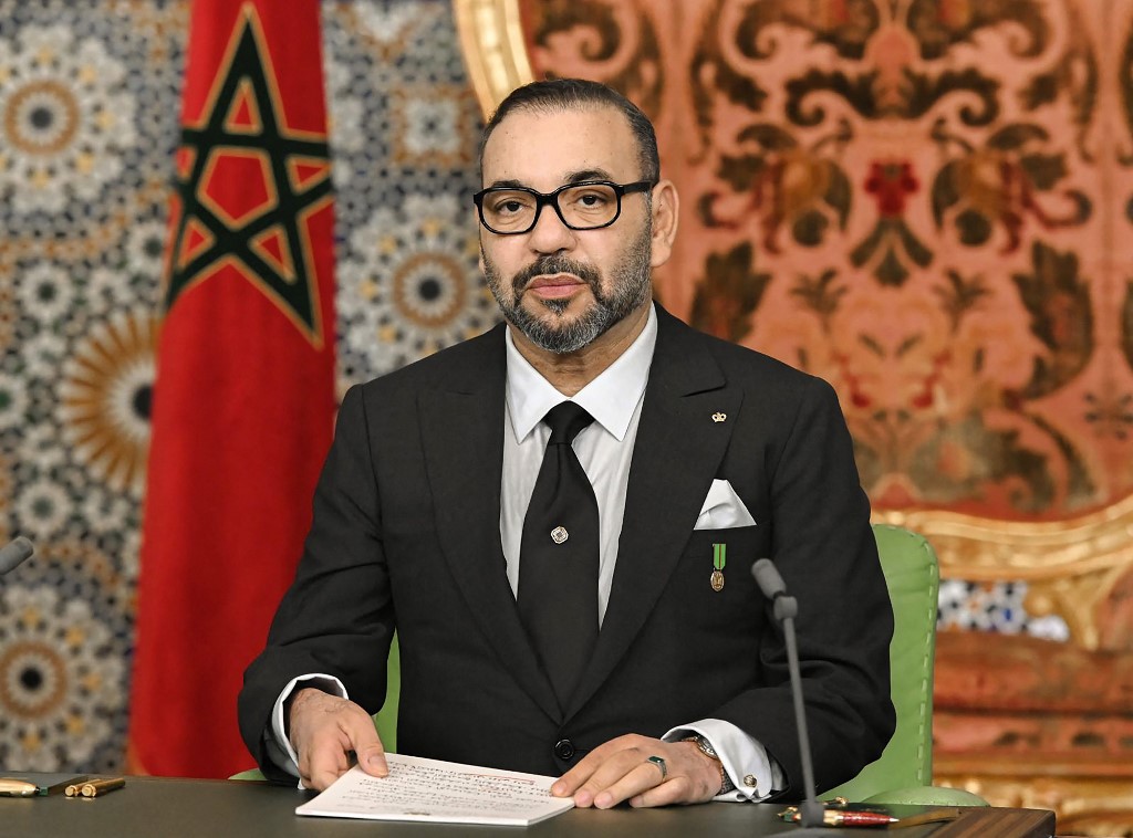 A handout picture released by the Moroccan Royal Palace on November 6, 2021, shows King Mohammed VI delivering a speech to the nation. (AFP)