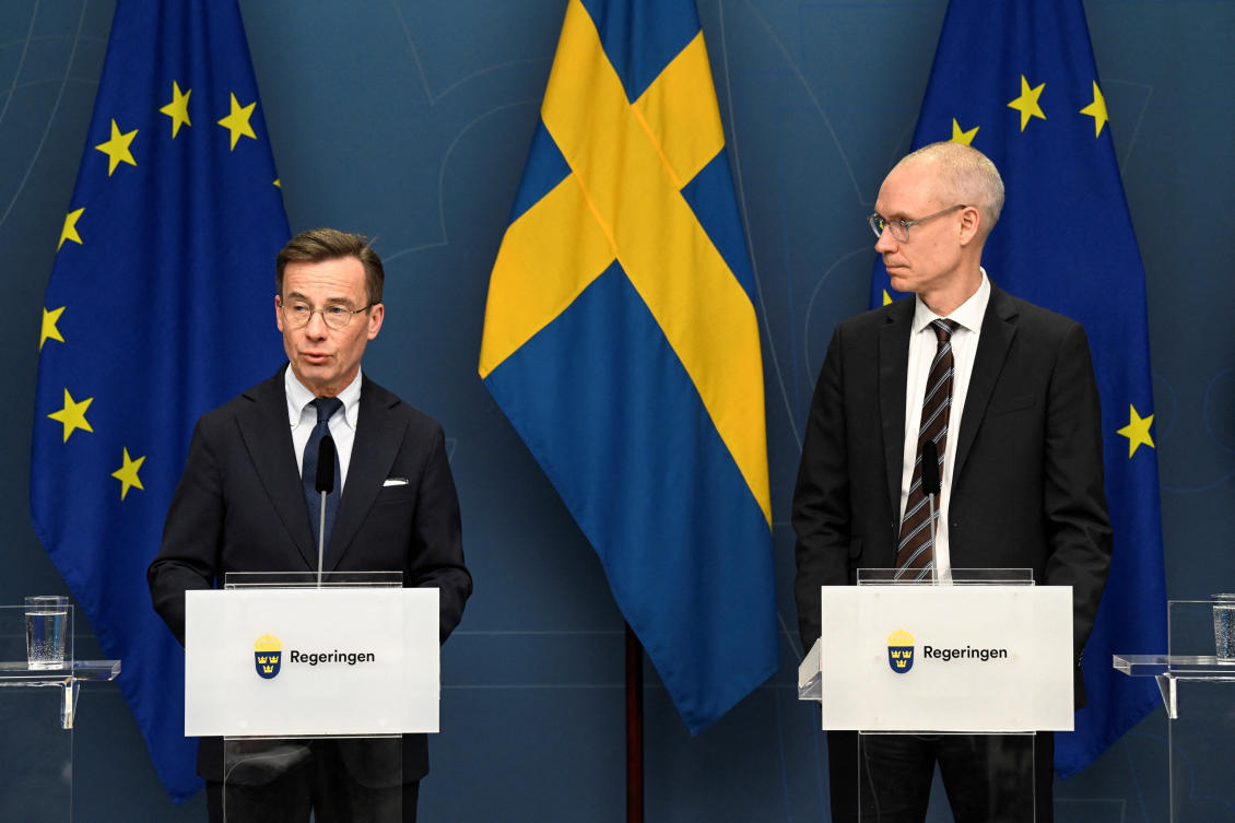 Swedish PM Ulf Kristersson and Oscar Stenstrom, ambassador in the cabinet preparation and chief negotiator in the NATO process, hold a news conference on the NATO process, in Stockholm on Mar. 14, 2023. (Reuters)