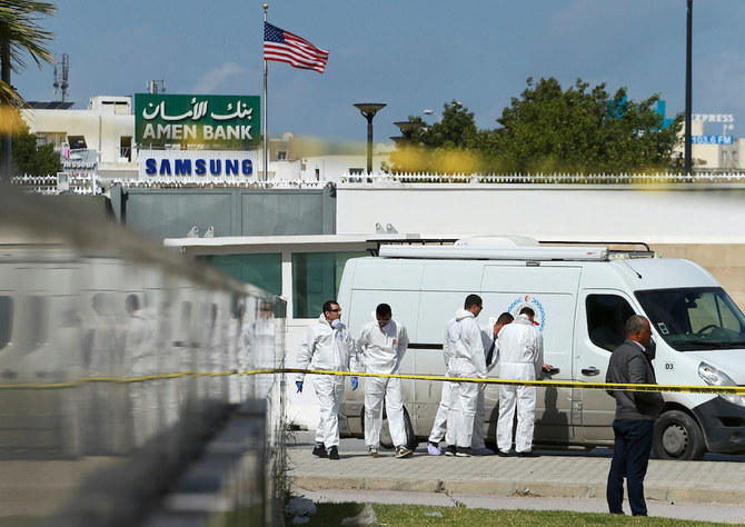 Police and forensic experts inspect the scene of an explosion near the US embassy in the Tunisian capital Tunis on March 6, 2020. (File/AFP)