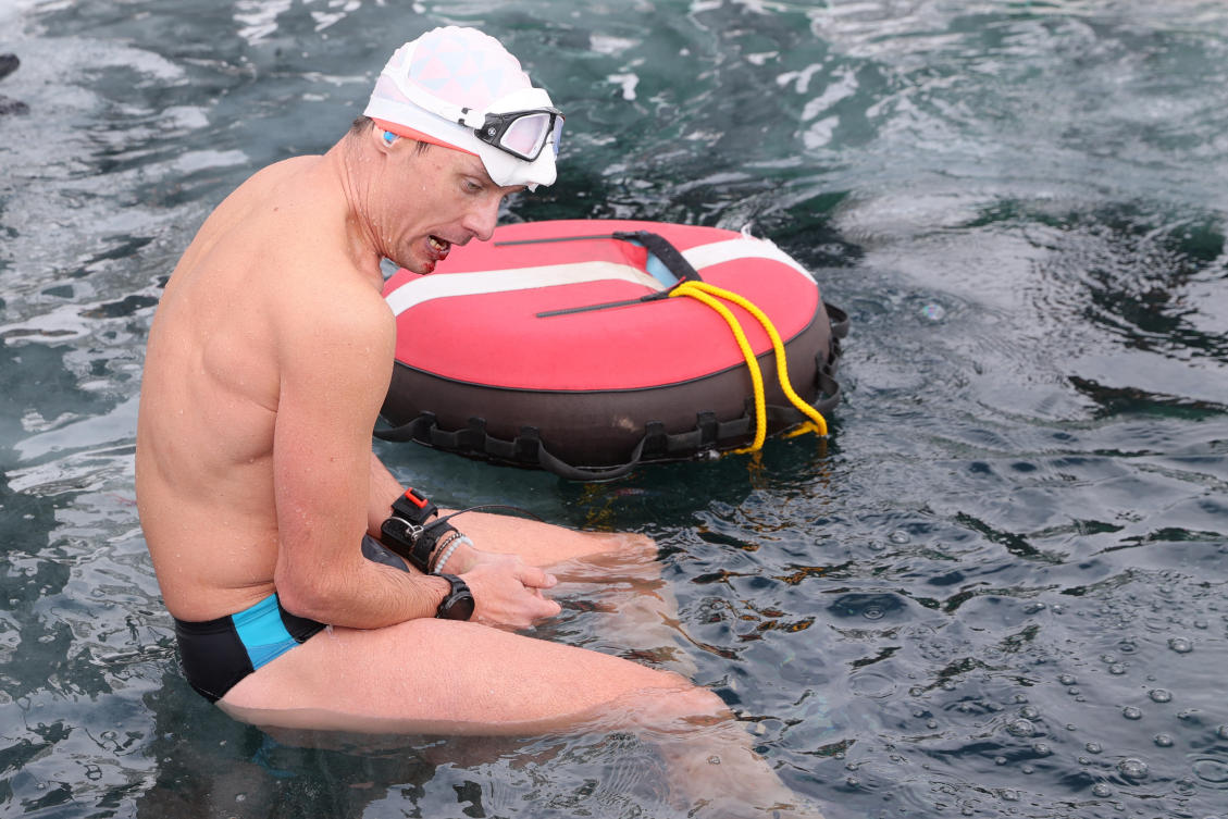 Free-diver plunges to record depth beneath frozen Swiss lake