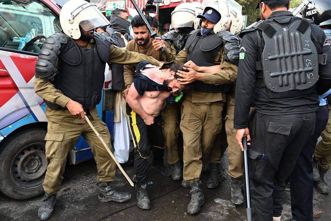 Former prime minister Imran Khan’s supporters continued to clash with security forces that had come to arrest him. (AFP)
