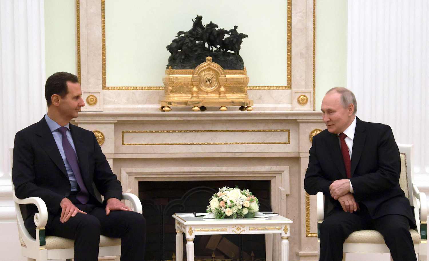 Russian President Vladimir Putin meets with his Syrian counterpart Bashar Al-Assad at the Kremlin in Moscow on March 15, 2023. (AFP)