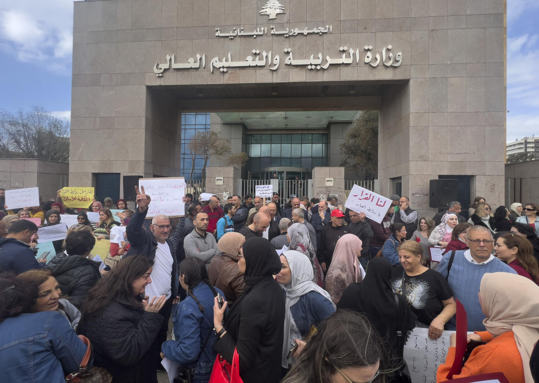 Lebanese teachers protest outside the Education Ministry, in Beirut, Lebanon, amid dramatic currency devaluations that slashed their salaries to about $20 a month. (AP)