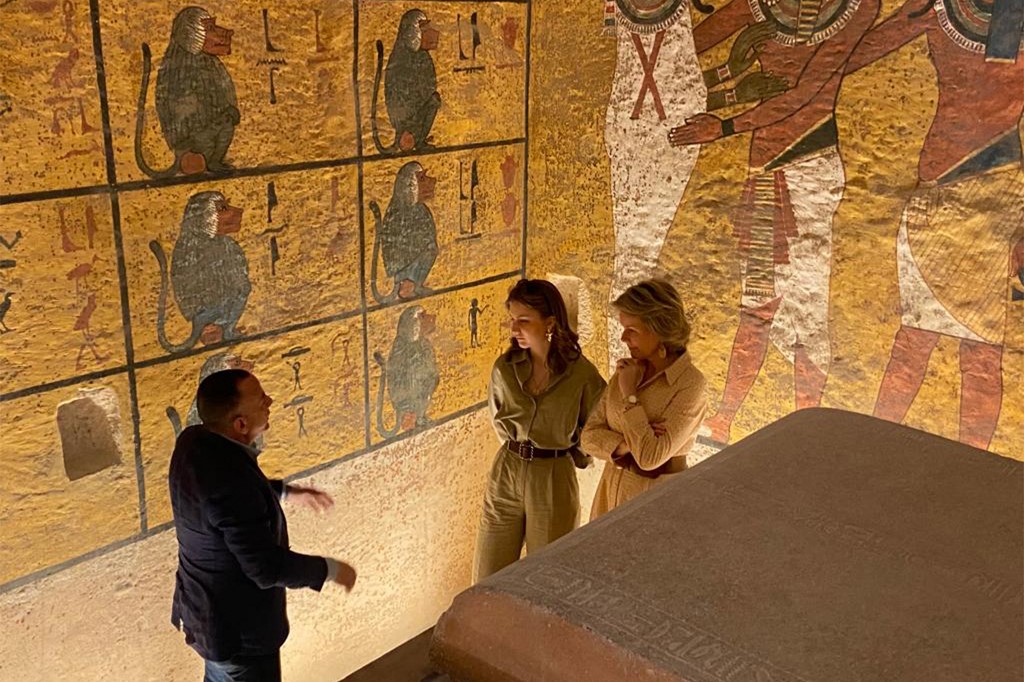 Queen Mathilde of Belgium, right, and her daughter Princess Elisabeth tour the tomb of the ancient Egyptian New Kingdom Pharaoh Tutankhamun with Mostafa Waziri, head of Egypt’s Supreme Council of Antiquities, in the Valley of the Kings. (Egyptian Ministry of Antiquities/AFP)