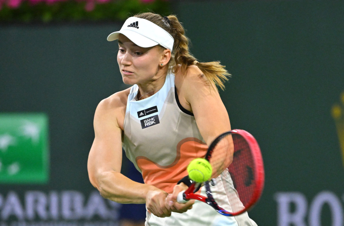 Elena Rybakina of Kazakhstan hits a shot as she defeated Poland's Iga Swiatek in the semifinals of the BNP Paribas Open at the Indian Wells Tennis Garden.(Jayne Kamin-Oncea-USA TODAY Sports)