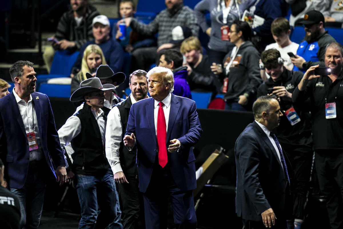 Former President Donald J. Trump waves as he arrives for the NCAA Wrestling Championships on March 18, 2023, in Tulsa, Oklahoma. (AP)