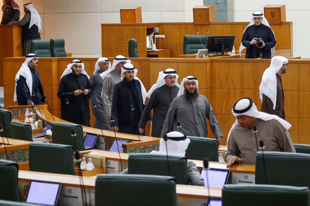 Kuwaiti MPs take their seats ahead of a session at the National Assembly (parliament) in Kuwait City, on January 24, 2023. (File/AFP)
