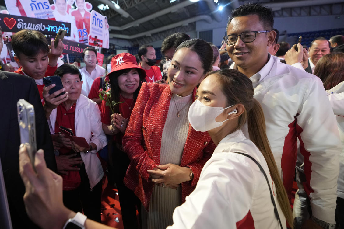 Paetongtarn Shinawatra, center, one of the opposition Pheu Thai party’s top politicians, is the frontrunner to be Thai prime minister in opinion surveys. (AP)