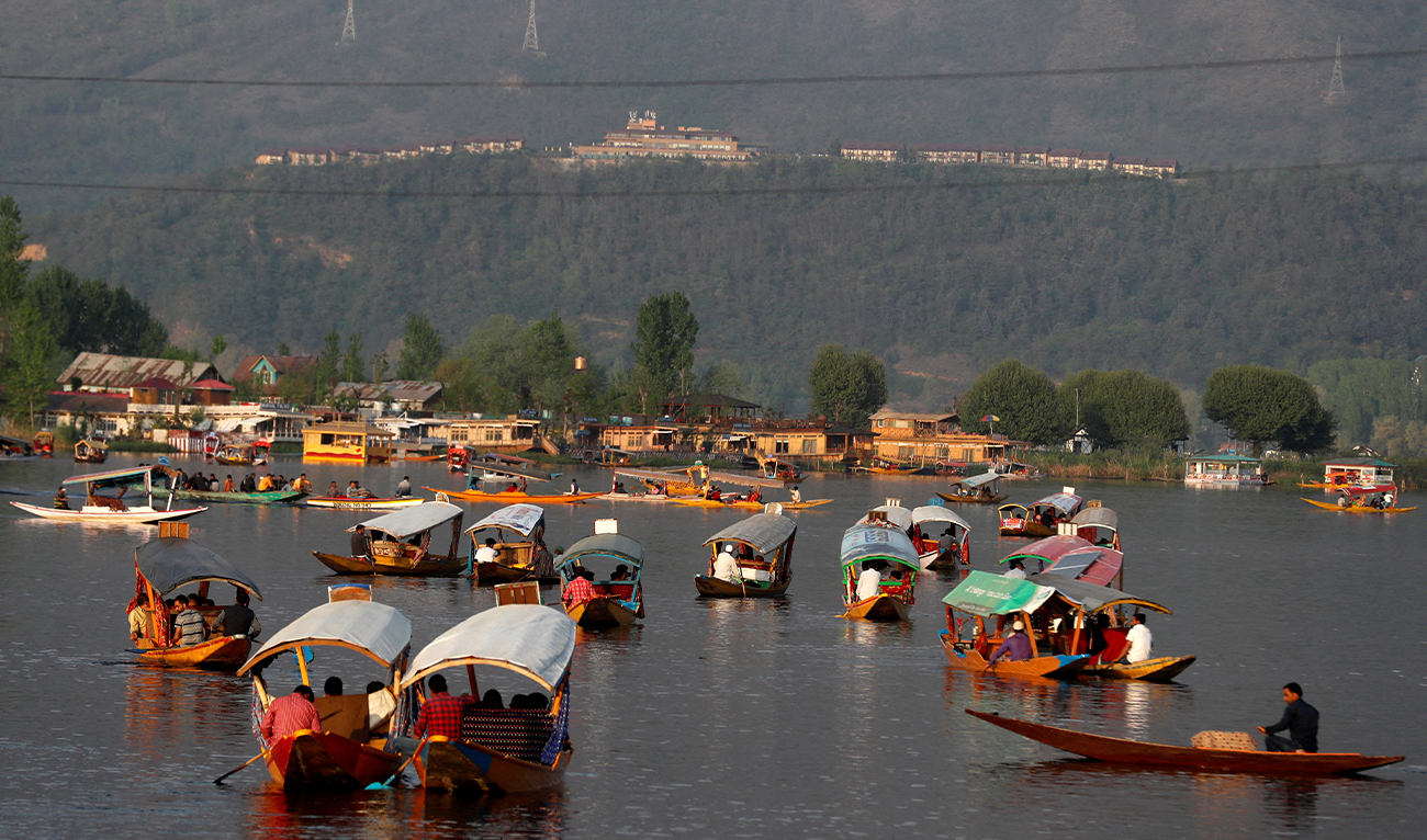 Tourists ride "Shikaras" or boats in the waters of Dal Lake in Srinagar on April 5, 2022. (REUTERS/File)
