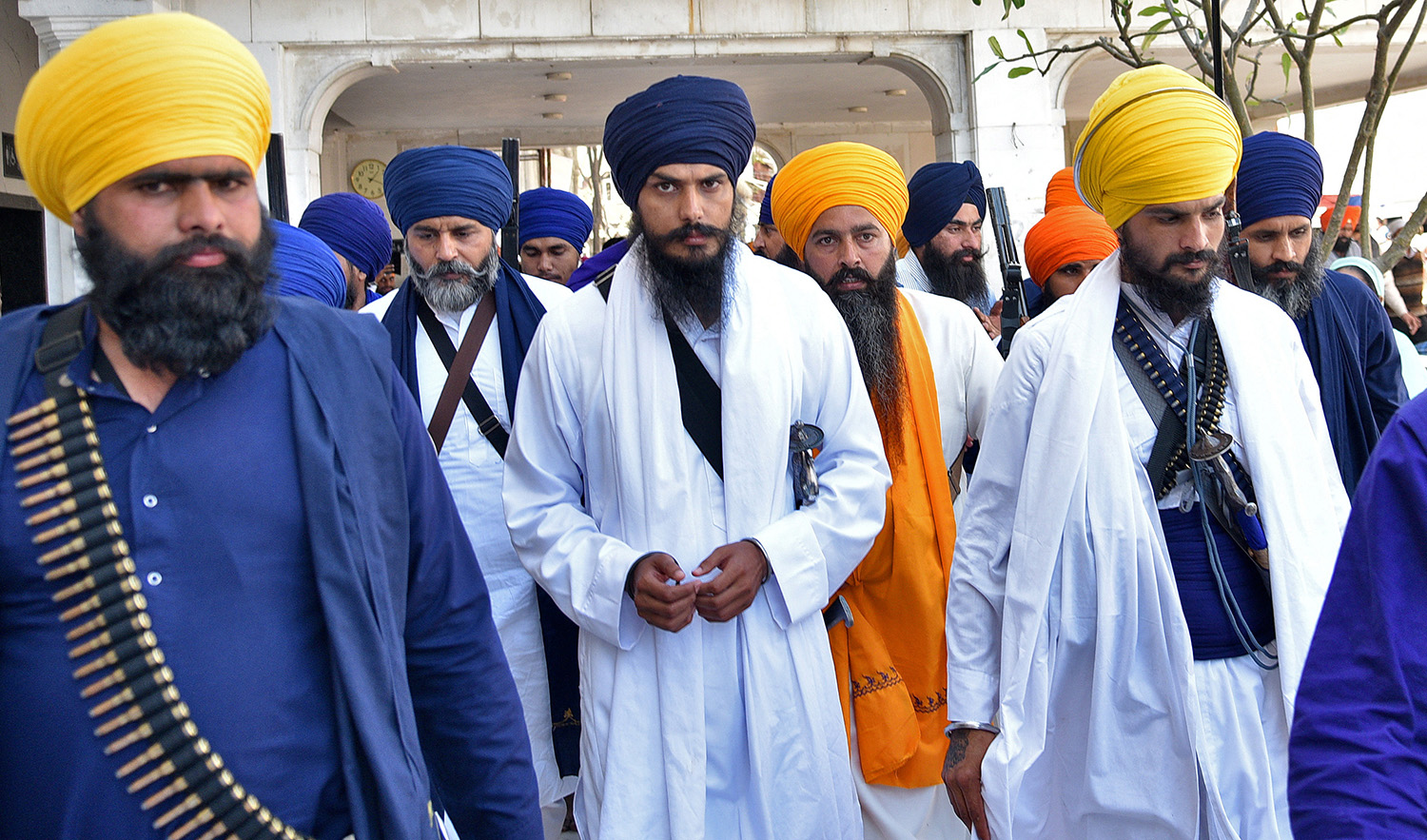 Amritpal Singh, a radical Sikh leader, leaves the holy Sikh shrine of the Golden Temple along with his supporters, in Amritsar, India, March 3, 2023. (REUTERS)
