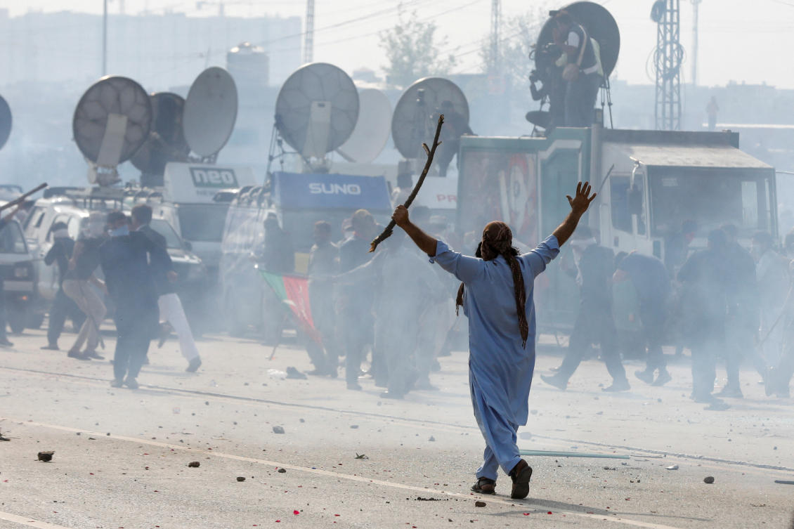 Former Pakistan prime minister Imran Khan’s supporters have clashed with police several times over recent days as authorities try to force him to appear in court in connection with various cases brought against him. (Reuters)