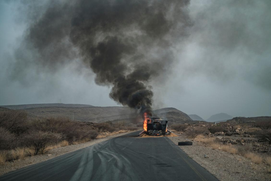 In this file photo taken on June 10, 2022 a truck, carrying grains to Tigray and belonging to the World Food Programme (WFP), burns out on a route 80 kilometers from the Semera, Ethiopia. (File/AFP)