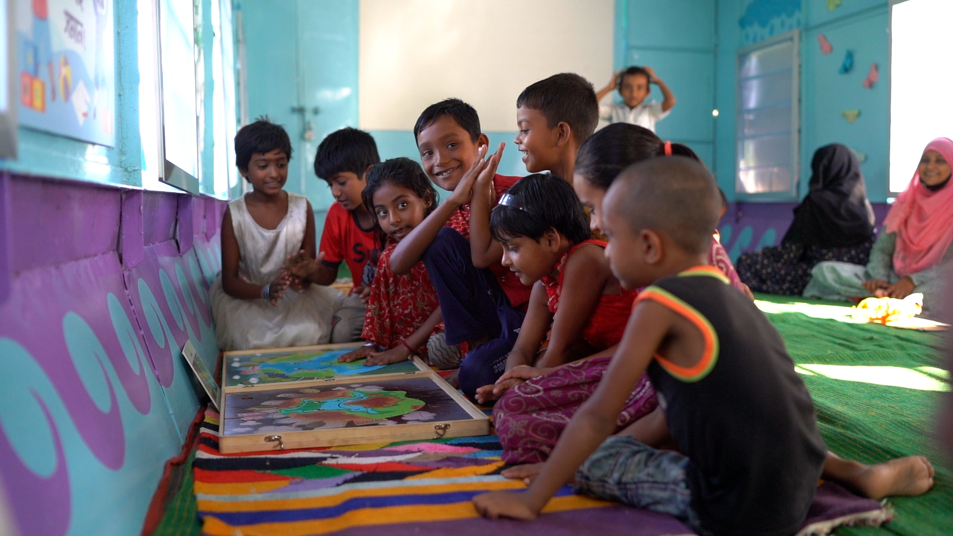 Bangladeshi children learn and play at a school boat run by BRAC in Koyla Ghat, Chandpur district on Feb. 14, 2023. (BRAC)