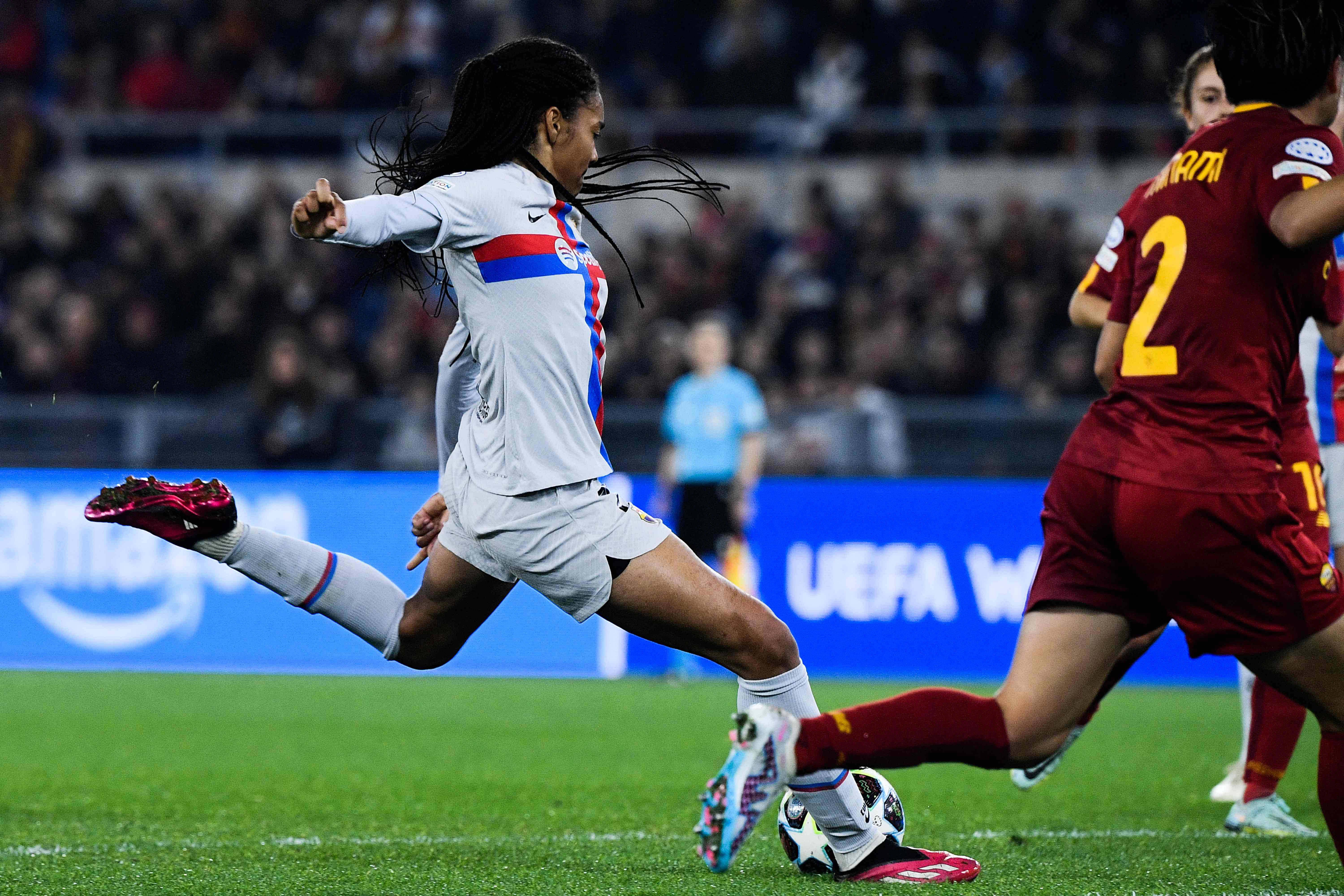 Barcelona's Spanish forward Salma Paralluelo shoots to open the scoring during their UEFA Women's Champions League quarterfinals first leg against AS Rome on Tuesday at the Olympic stadium in Rome. (AFP)