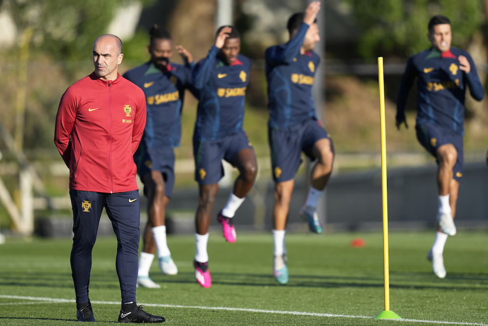 Portugal coach Roberto Martinez directs a training session in Oeiras, outside Lisbon, Tuesday. Portugal will play Liechtenstein Thursday in a Euro 2024 qualifying match in Lisbon, the first under new team head coach Martinez. (AP)