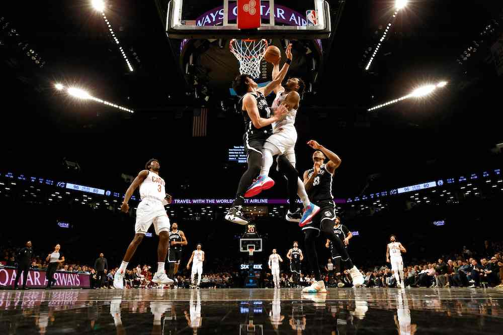 Donovan Mitchell of the Cleveland Cavaliers dunks against Yuta Watanabe of the Brooklyn Nets during their game at Barclays Center on Tuesday in New York City. (AFP)