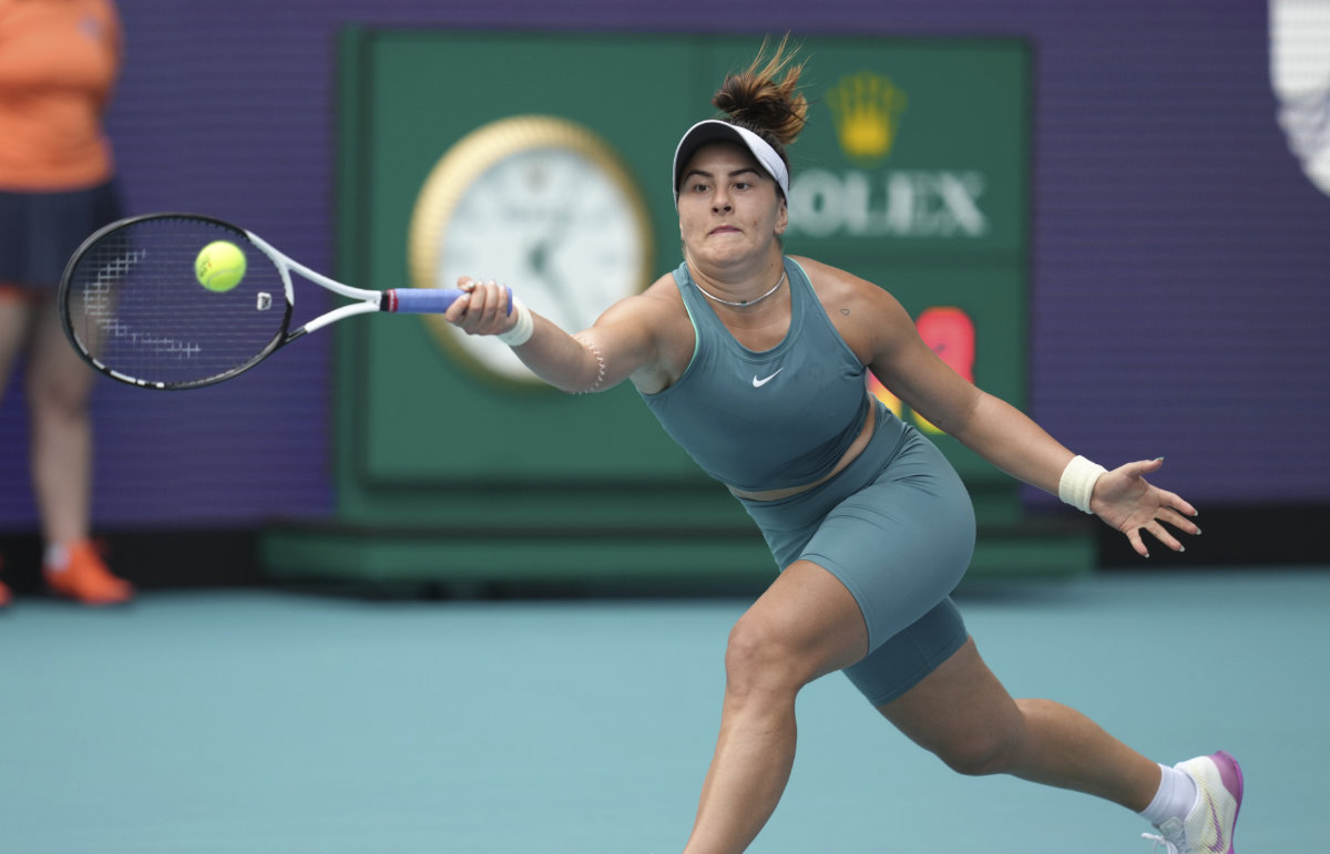 Bianca Andreescu of Canada returns a volley from Britain's Emma Raducanu in the first set of a match at the Miami Open tennis tournament on March 22, 2023, in Miami Gardens, Florida. (AP)