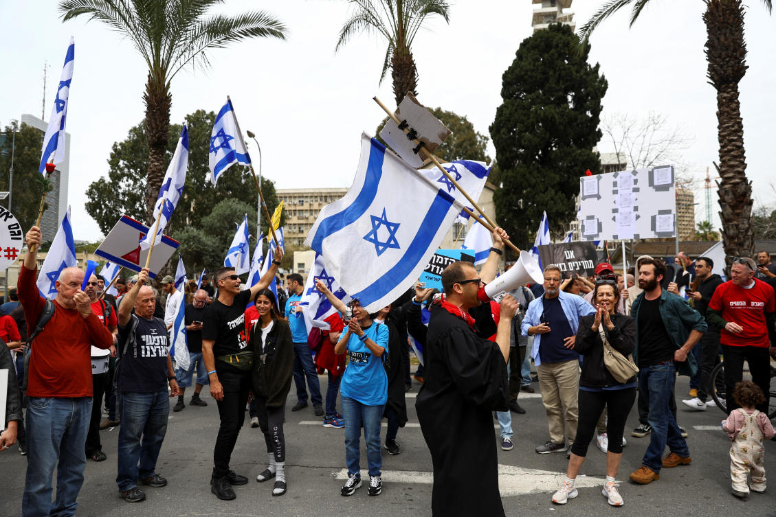 Demonstrators take part in the "Day of Shutdown" protest, as Israeli Prime Minister Benjamin Netanyahu's nationalist coalition government presses on with its judicial overhaul, in Tel Aviv. (Reuters)