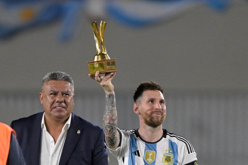 Argentina's forward Lionel Messi receives a recognition trophy after the friendly football match between Argentina and Panama at the Monumental stadium in Buenos Aires on Thursday. (AFP)