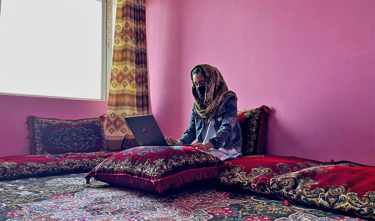 Sofia, an Afghan student, speaks English during an online class, at her house in Kabul, Afghanistan, on March 18, 2023. (REUTERS)