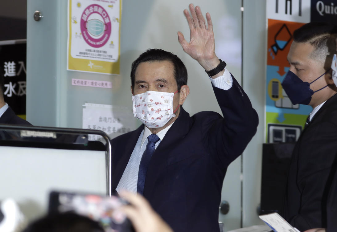 Former Taiwan President Ma Ying-jeou waves as Ma leaves for China, at Taoyuan International Airport in Taoyuan City, northern Taiwan, Monday, March 27, 2023. (AP)
