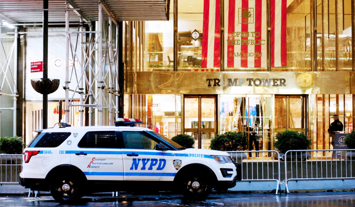 A NYPD police patrol car sits outside Trump Tower in New York City on March 27, 2023. Donald Trump staged his first presidential campaign rally in Texas March 25, 2023, brushing off his potential indictment as he railed against multiple criminal probes threatening his bid for the White House. (AFP)