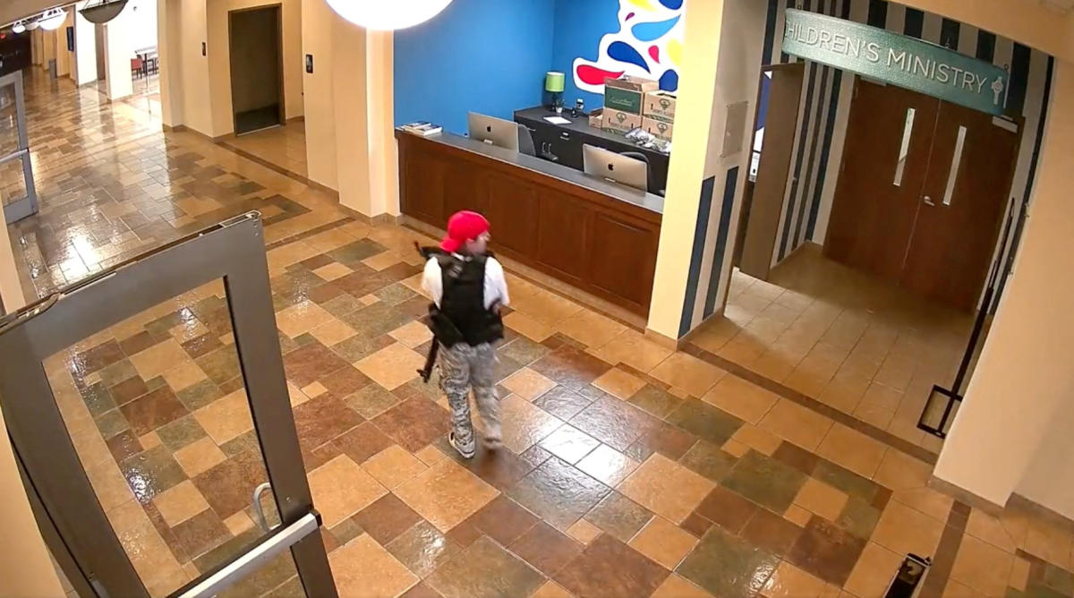 A still image from surveillance video shows mass shooting suspect Audrey Elizabeth Hale entering The Covenant School carrying weapons in Nashville, Tennessee on March 27, 2023. (Metropolitan Nashville Police Department via Reuters)