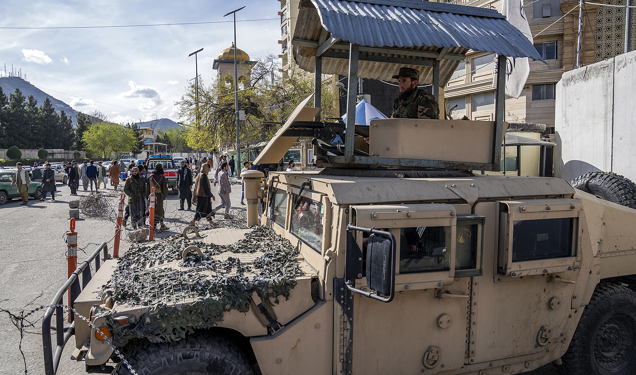 Taliban fighters stand guard at the explosion site, near the Foreign Ministry in Kabul, Afghanistan, Monday, March 27, 2023. (Photo courtesy: AP)