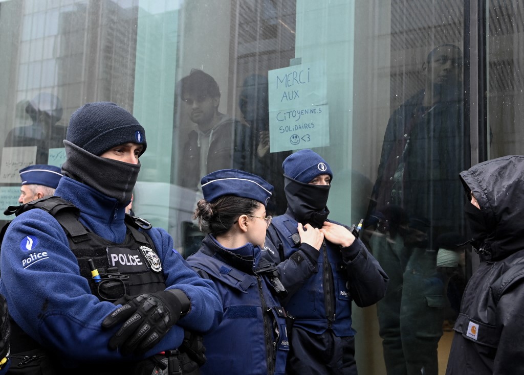 Brussels federal police carried out raids in the nearby localities of Zaventem, Sint-Jans-Molenbeek and Schaerbeek as part of a separate case, and arrested three people (AFP)