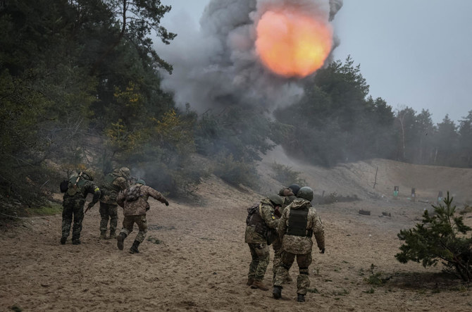 Ukrainian servicemen from the Volyn Territorial Defense brigade attend an exercise near the border with Belarus in Volyn region, Ukraine on Jan. 12, 2023. (Reuters)