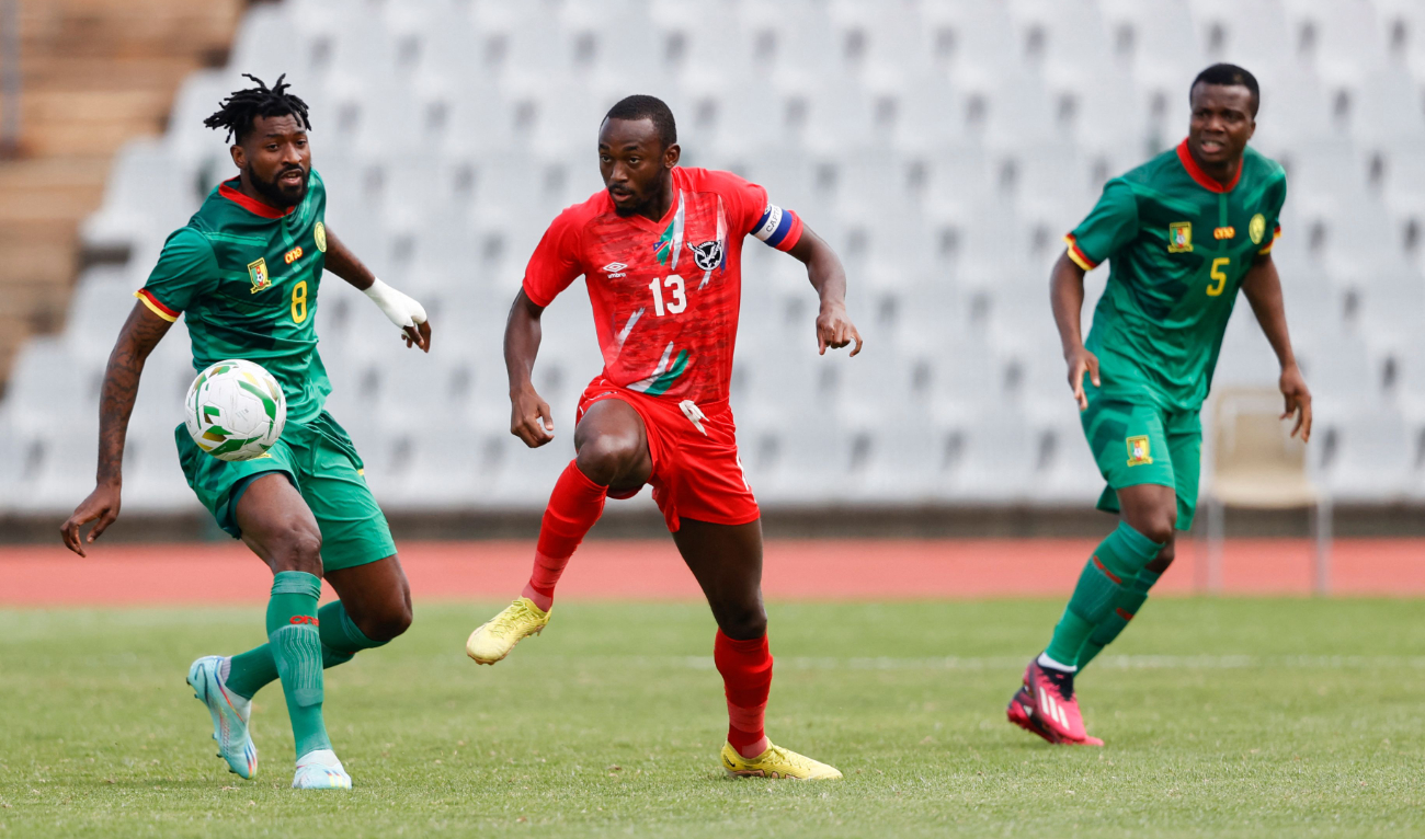 Namibia's Peter Shalulile (C) fights for the ball with Cameroon's Andre-Frank Zambo Anguissa (L) during the 2023 Africa Cup of Nations (CHAN) Group C qualifier match between Namibia and Cameroon at the Dobsonville Stadium in Soweto on Tuesday. (AFP)