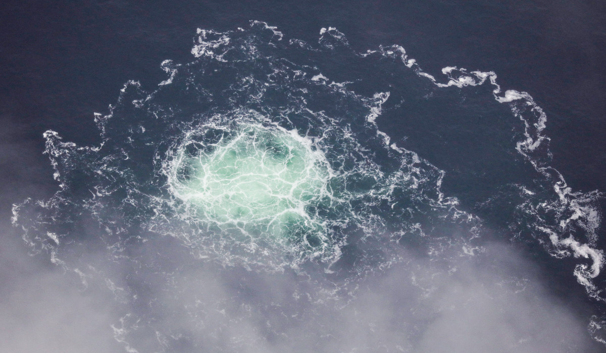 This handout photo taken on September 28, 2022 from an aircraft of the Swedish Coast Guard (Kustbevakningen) shows the release of gas emanating from a leak on the Nord Stream 2 gas pipeline, in the Swedish economic zone in the Baltic Sea. (AFP)