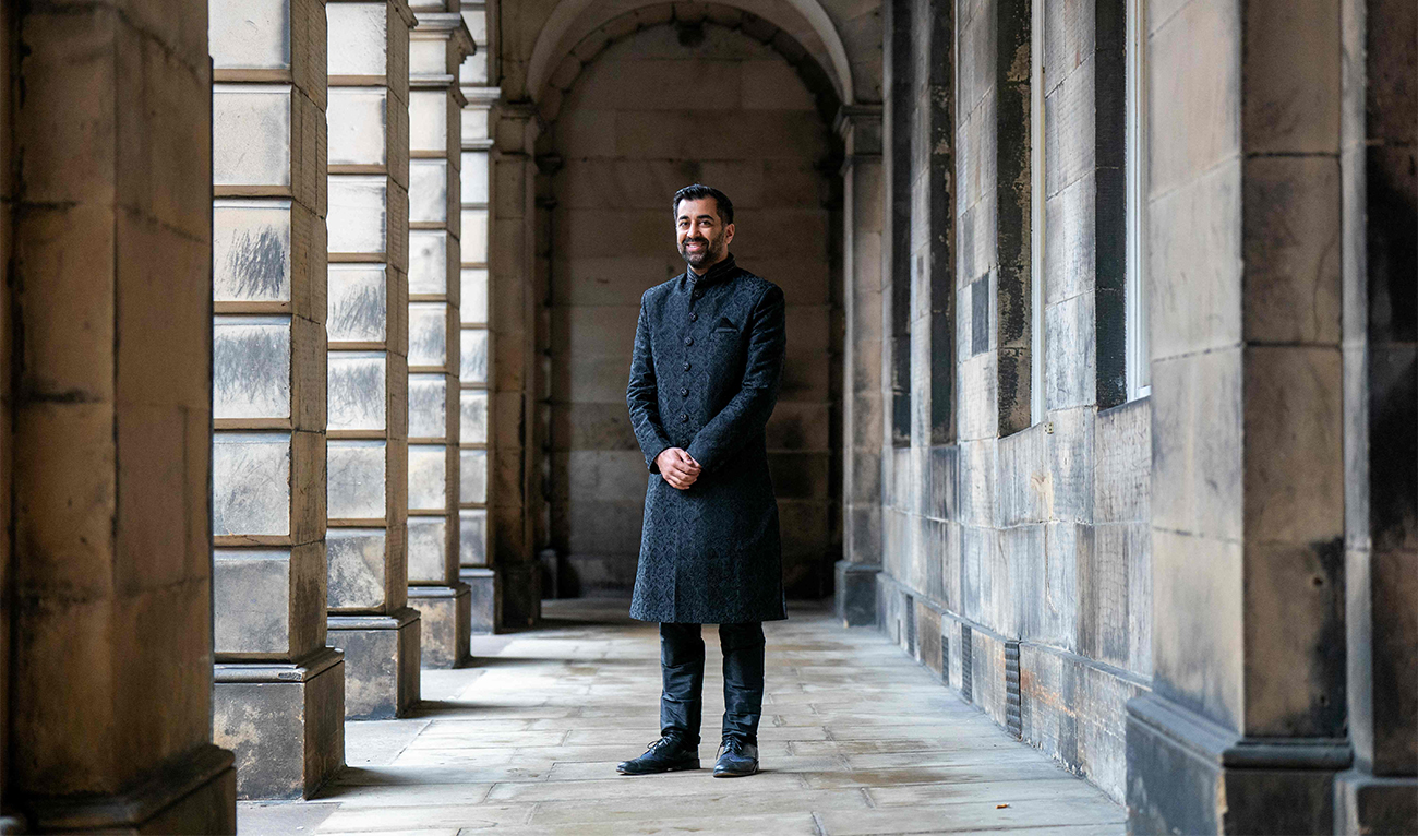 Leader of the Scottish National Party (SNP), Humza Yousaf, and Scotland's First Minsiter, poses for a photograph after being hi swearing-in ceremony at the Court of Session in Edinburgh on March 29, 2023. (AFP)