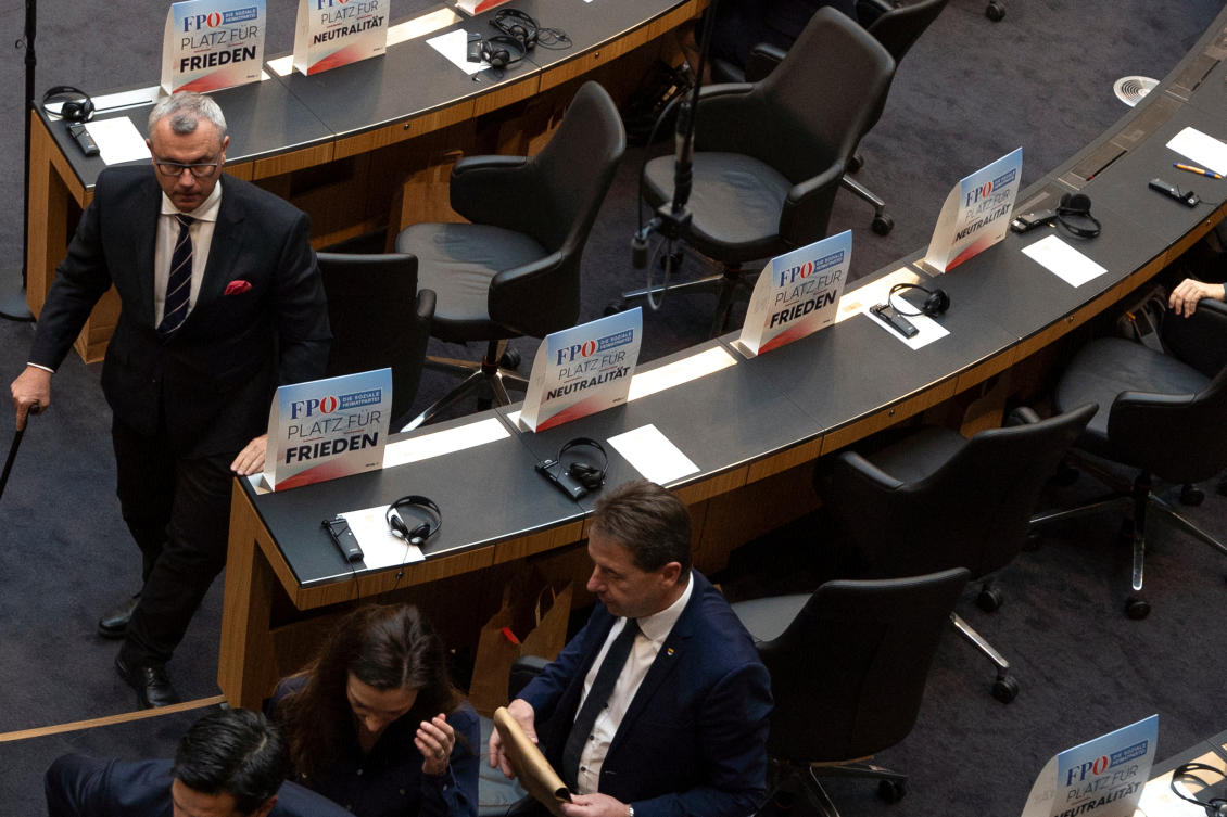 Lawmakers from the Party walk out of the lower house of Austria’s parliament as Ukrainian president Volodymyr Zelensky addressed the chamber via video link. (Reuters)