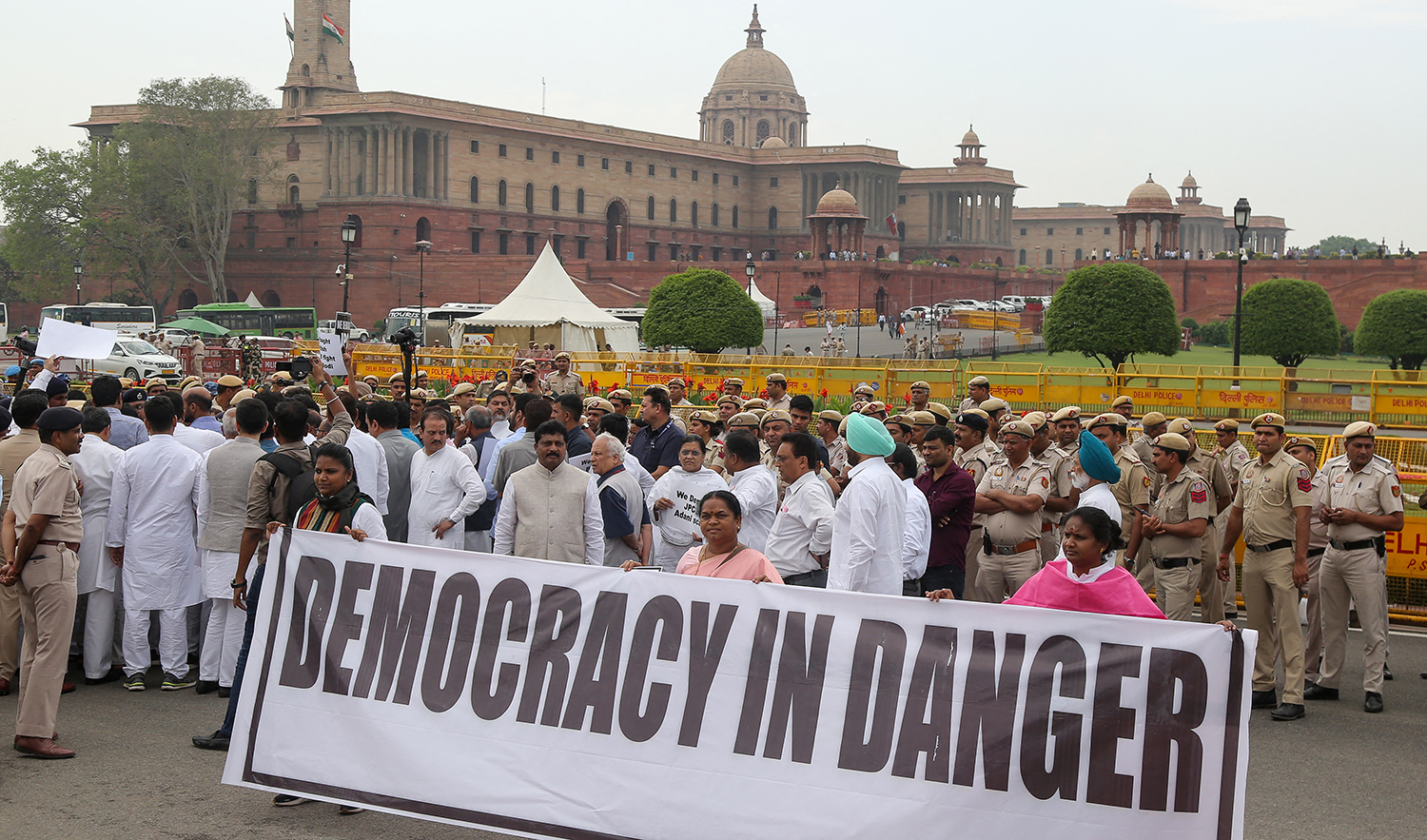 India's Congress party leaders along with members of parliament of various opposition parties take part in a protest march towards India’s presidential palace Rashtrapati Bhawan, against conviction of Congress party member Rahul Gandhi in a criminal defamation case during a demonstration in New Delhi on March 24, 2023. (AFP)