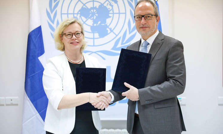 Ambassador Päivi Peltokoski, of the Representative Office of Finland and Karim Amer, UNRWA Director of Partnerships. (UNRWA)
