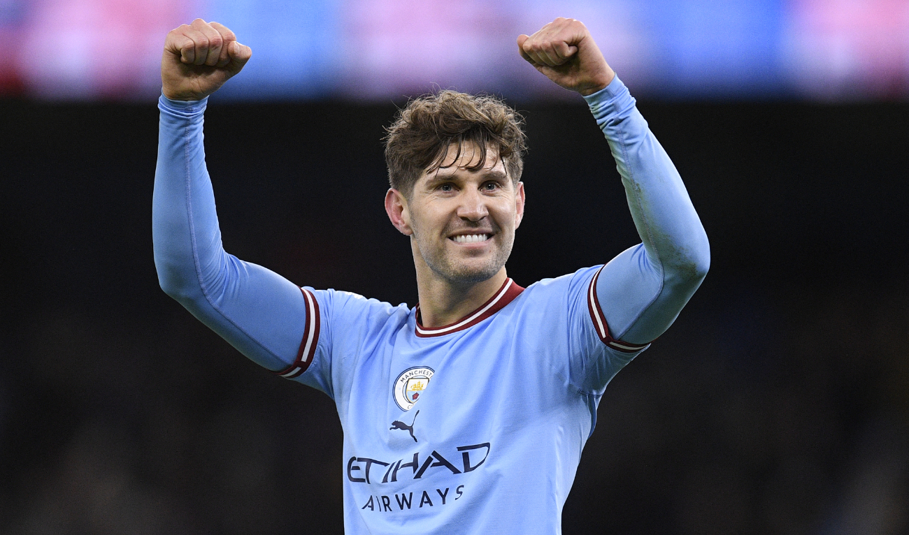 Manchester City's English defender John Stones celebrates after the final whistle during the English Premier League football match between against Tottenham Hotspur at the Etihad Stadium in Manchester, on January 19, 2023. (AFP)