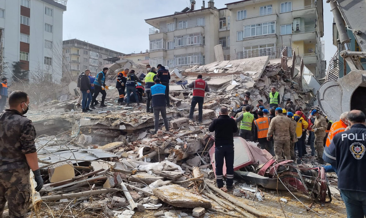 Rescuers carry on search operations among the rubble of collapsed buildings in eastern Turkey on February 27, 2023. (AFP)