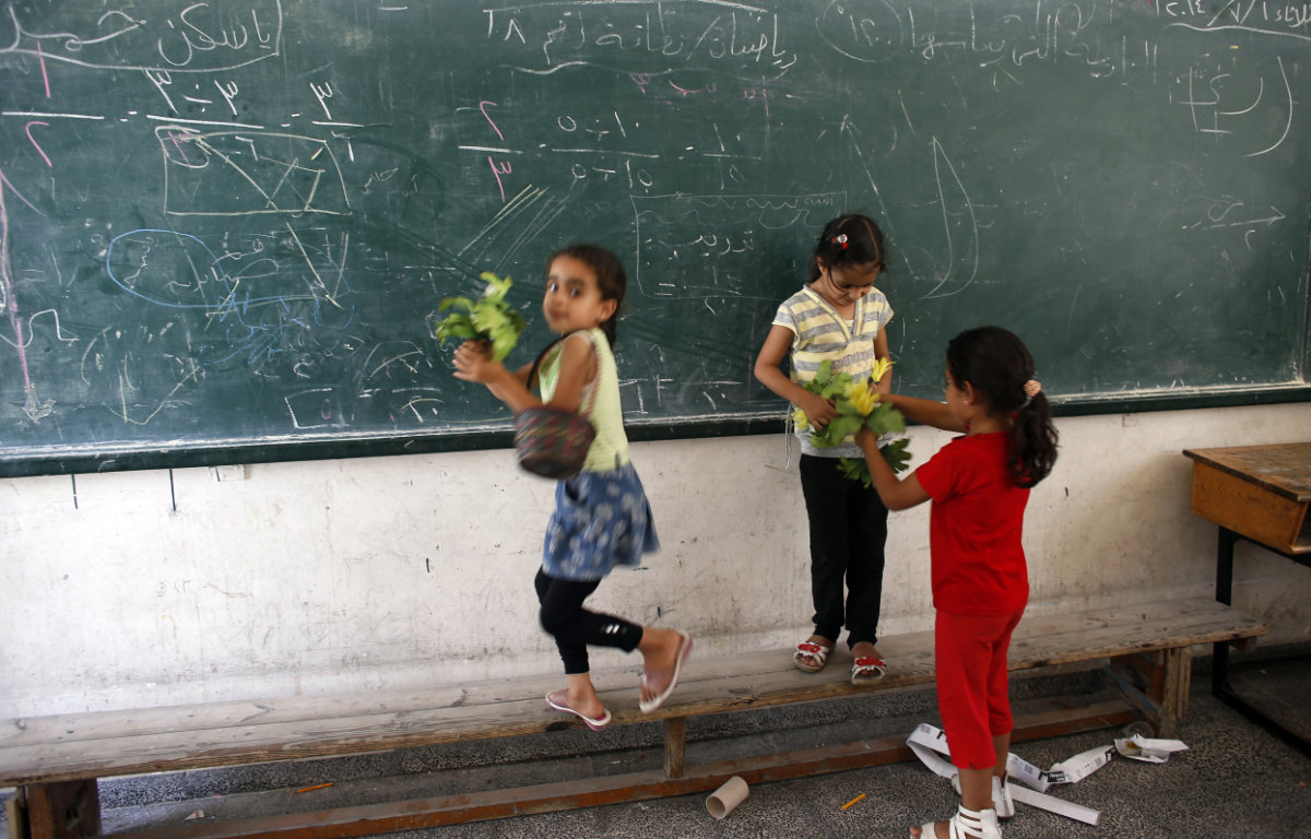 Palestinian children attending a class at an UNWRA school in Gaza. (AFP file)