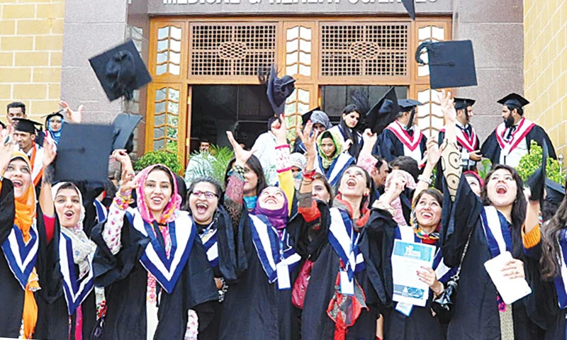 This undated file photo shows university students throwing their mortarboards on their graduation day. (Photo courtesy: social media)