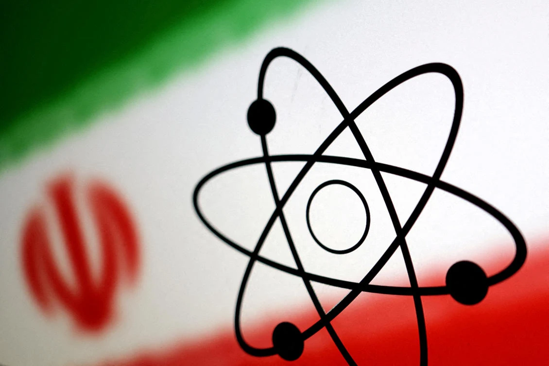 Atom symbol and Iran flag are seen in this illustration (REUTERS)