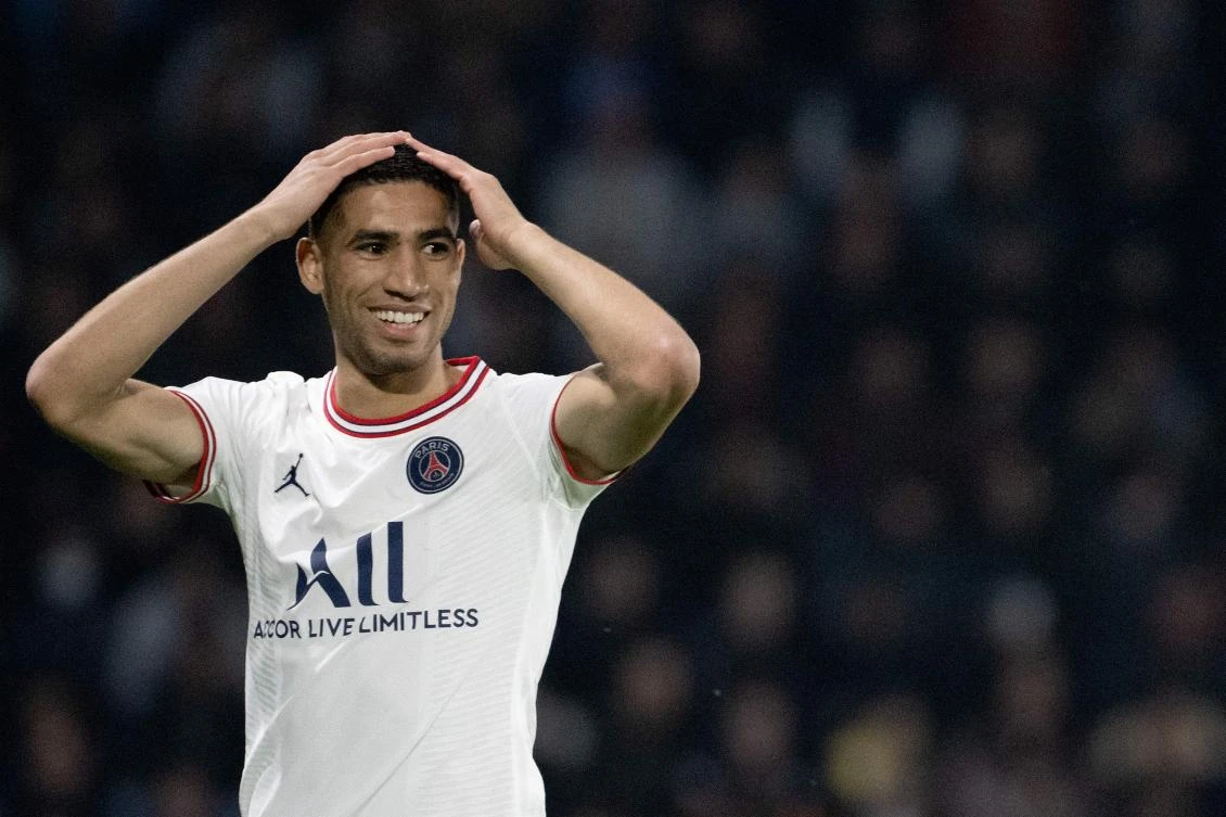 In this file photo taken on April 20, 2022 PSG’s Moroccan defender Achraf Hakimi reacts during their French L1 match against Angers SCO at the Raymond-Kopa Stadium in Angers, France. (AFP)