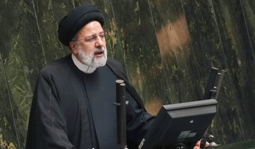 Iranian President Ebrahim Raisi addresses lawmakers while defending his next year's budget bill at the parliament in Tehran, Iran, Sunday, Jan. 22, 2023. (AP)