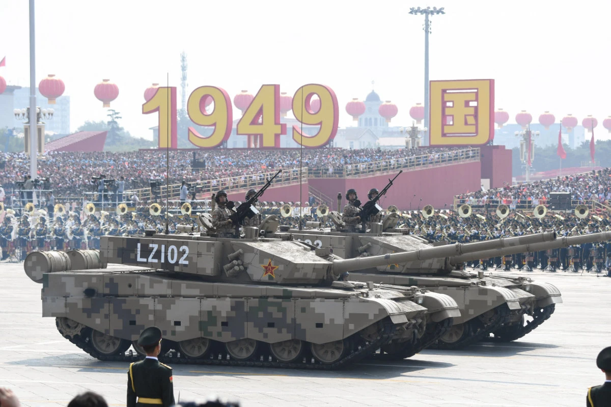 Military vehicles take part in a military parade at Tiananmen Square in Beijing on October 1, 2019, to mark the 70th anniversary of the founding of the People’s Republic of China. (AFP)