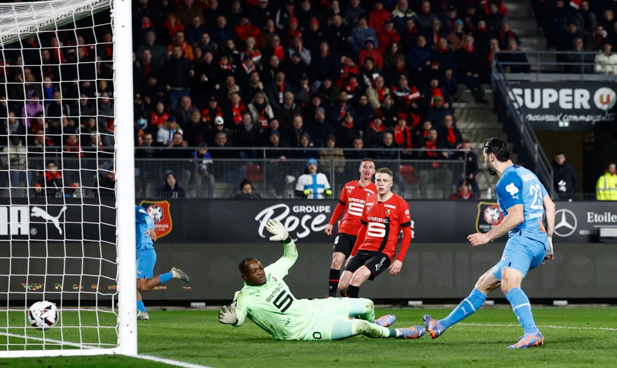Olympique de Marseille's Sead Kolasinac scores their first goal in the French league match against Rennes on Sunday. (Reuters)