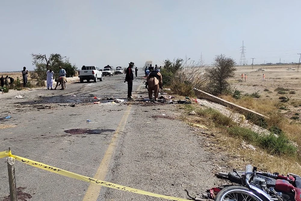Security forces have been battling a years-long insurgency by Baloch militants, as well as attacks by the Pakistani Taliban. Above, the site of the suicide attack on a police truck near Dhadar, the main town of Kachhi district in Balochistan province on March 6, 2023. (AFP)