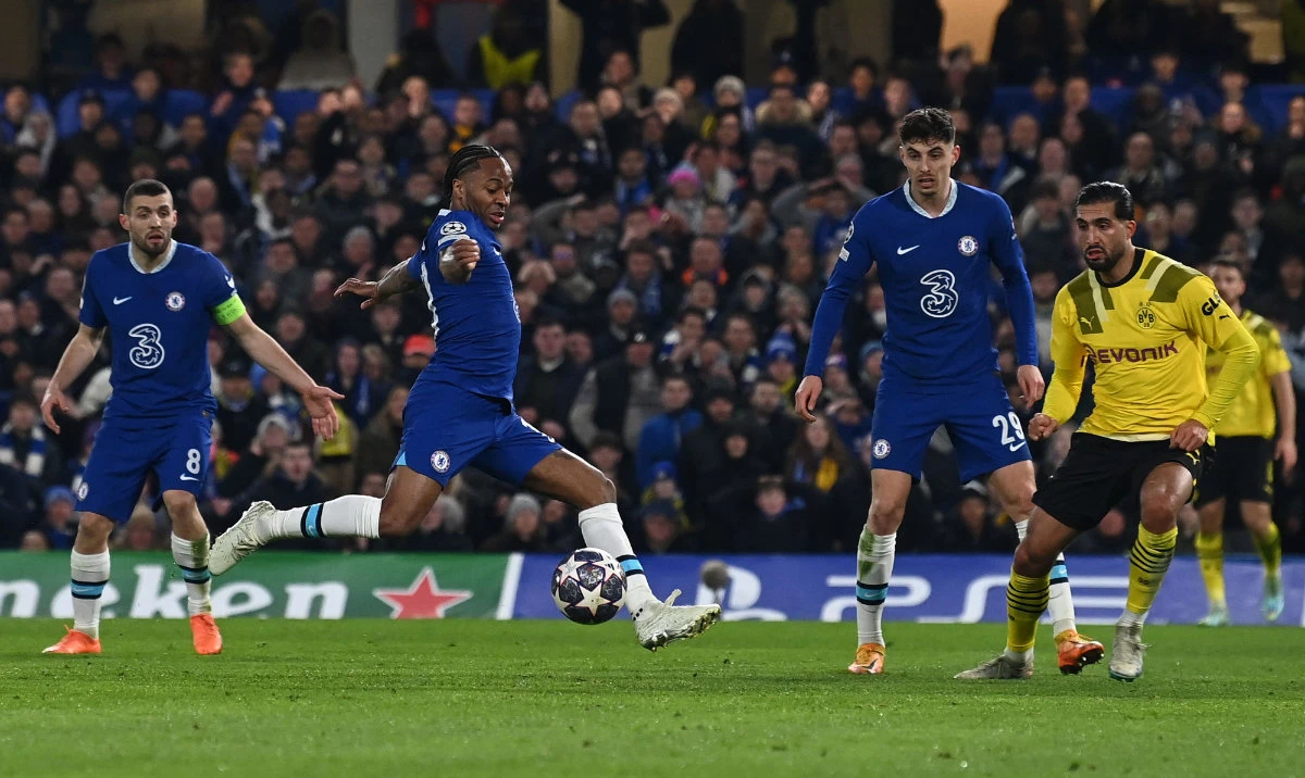 Chelsea's English midfielder Raheem Sterling scores their opening goal during the UEFA Champions League round of 16 second leg against Borrusia Dortmund at Stamford Bridge in London on Tuesday. (AFP)
