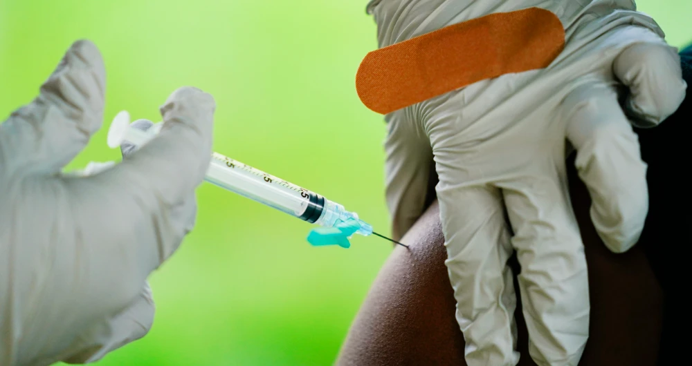 Fewer than a third of people in low-income countries have received at least one vaccine dose. (AP)