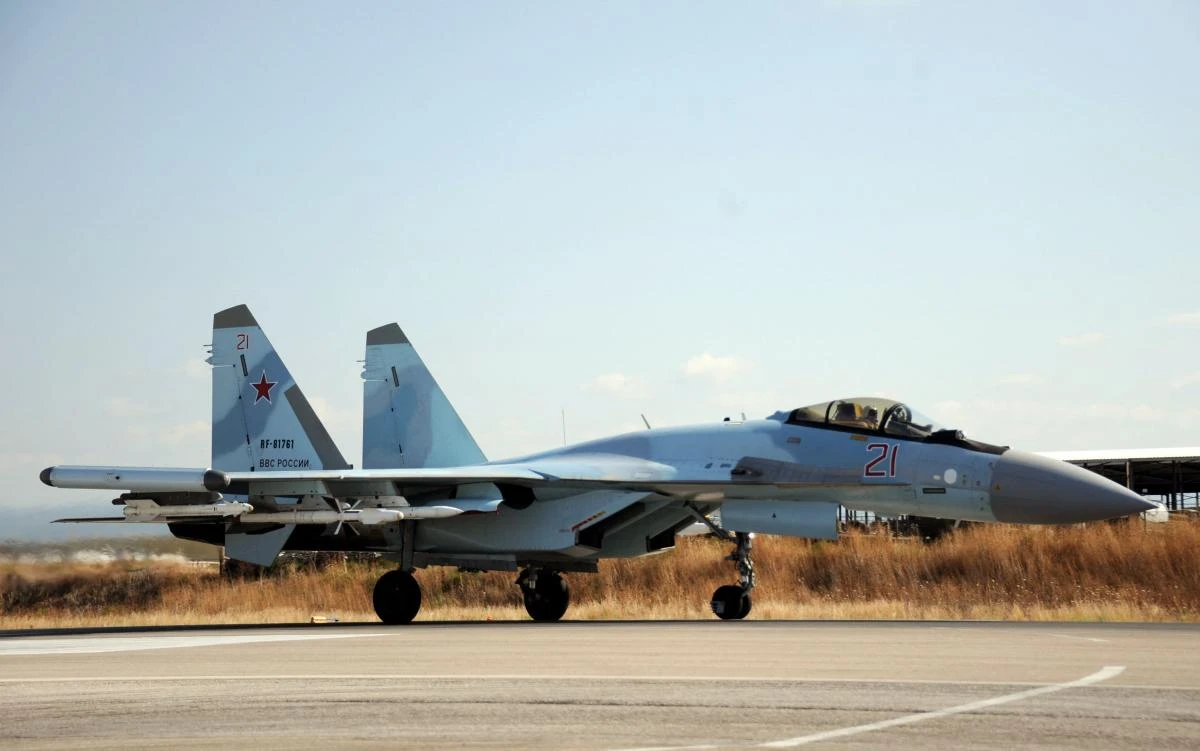 a Russian air force Sukhoi Su-35 fighter lands at the Russian military base of Hmeimim, located south-east of the city of Latakia. Iran has announced finalising the contract for purchasing advanced Sukhoi Su-35 fighter jets from Russia, state media reported as defence cooperation between the two countries deepens. (AFP)